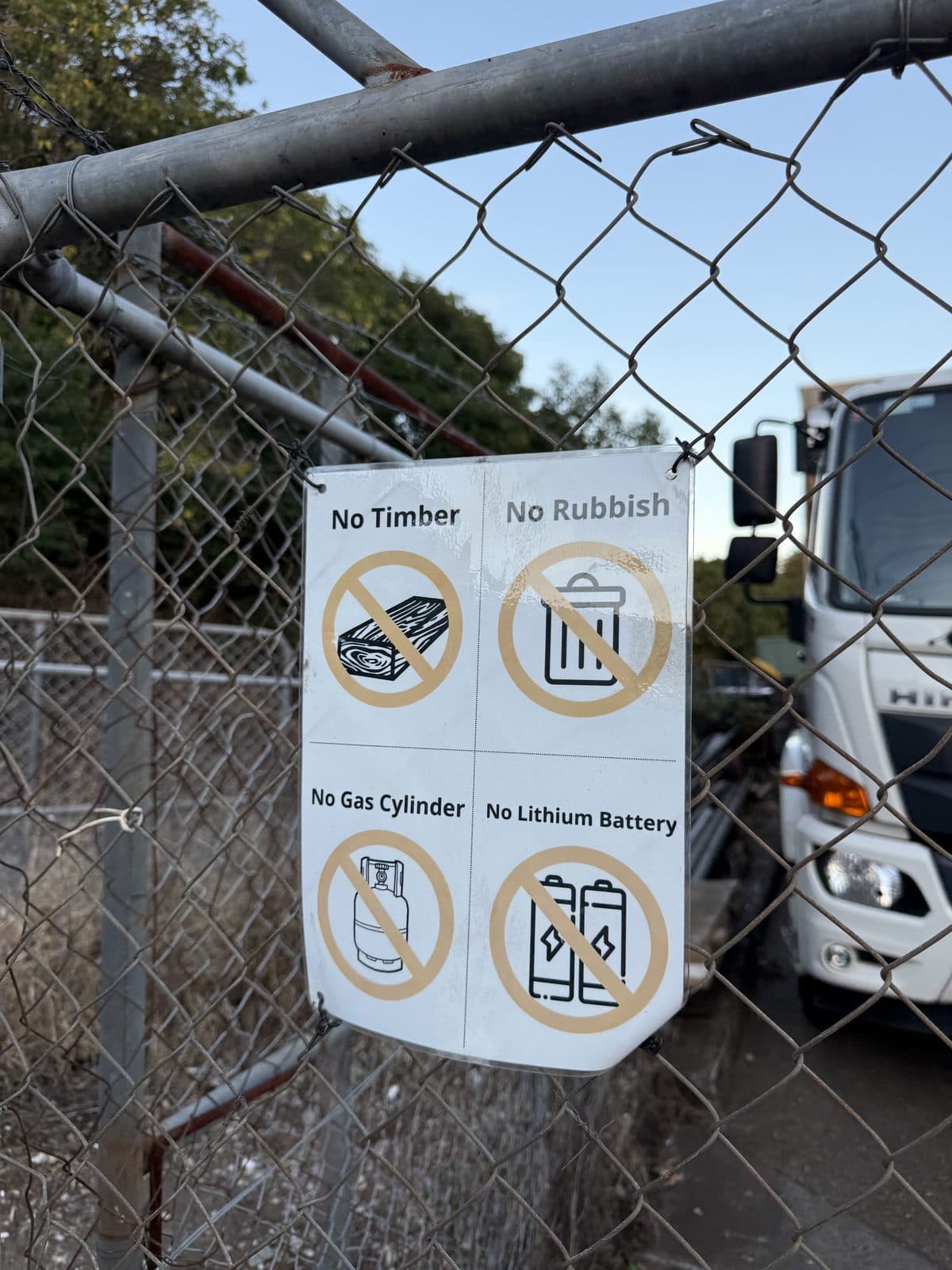 Sign on the drop-off gate: No Timber, No Rubbish, No Gas Cylinder, No Lithium Battery