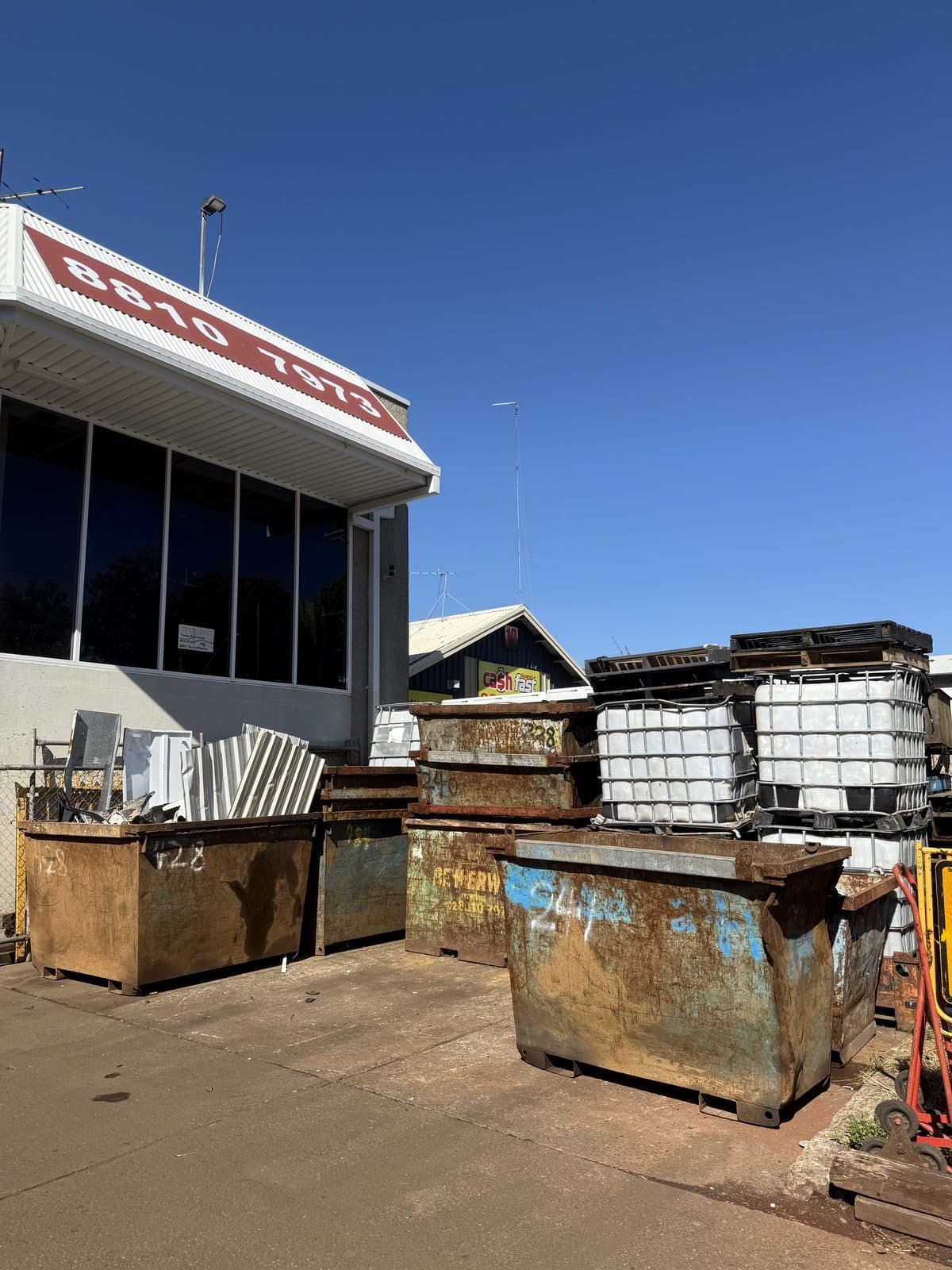 Betterway Metal yard in North Parramatta with bins, IBC totes and the office front